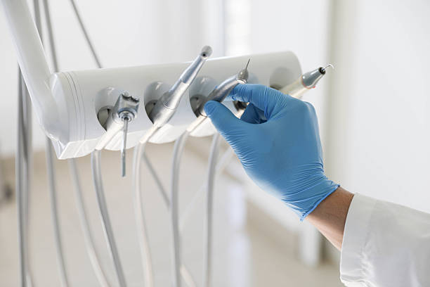 Professional Tooth Extraction technician working in Ellsworth, KS